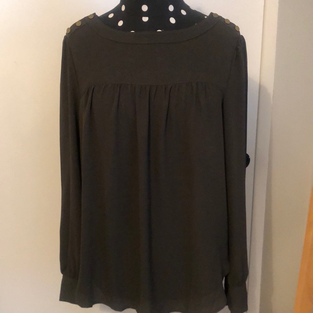 New with tags! Green blouse with buttons.